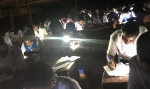 Some of the affected WASCCE candidates sitting for the late-night exam. WAEC apologised for the hours-long delay